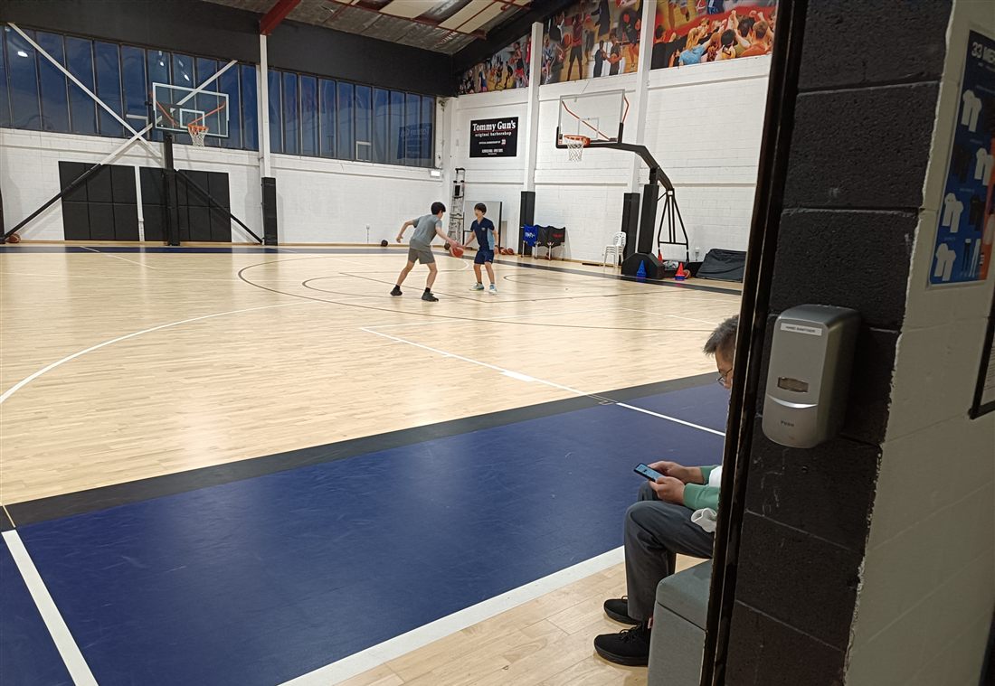 Basketball training session in an indoor stadium